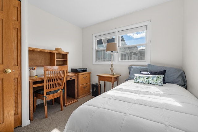 carpeted bedroom with vaulted ceiling