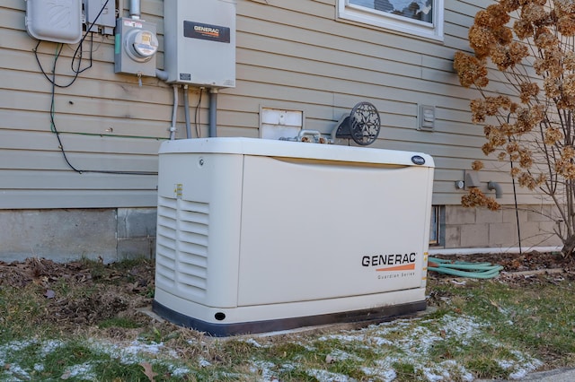 exterior details with electric meter and a power unit