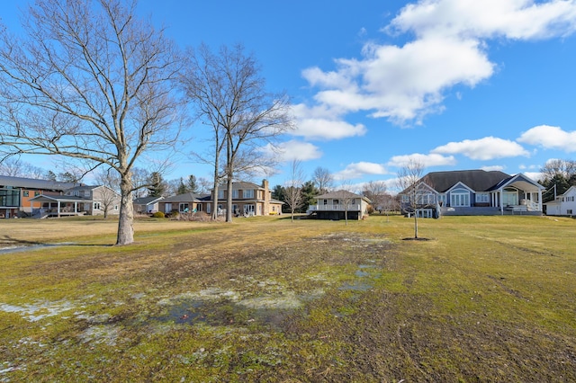 view of yard featuring a residential view