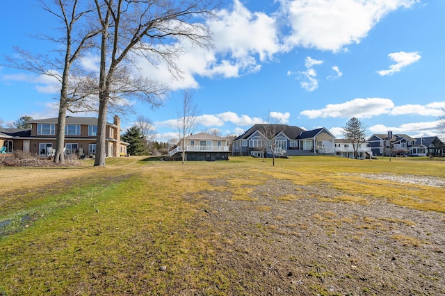 view of yard featuring a residential view