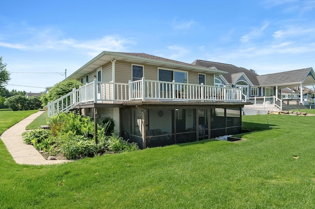 7585 S Indian Lake Dr, Vicksburg, MI 49097 - back of house featuring a deck and a lawn