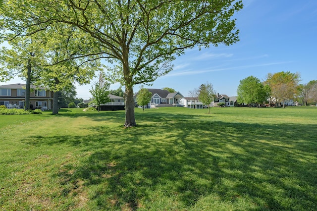 7585 S Indian Lake Dr, Vicksburg, MI 49097 - view of green lawn featuring a residential view