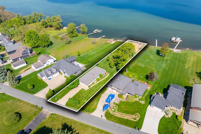 7585 S Indian Lake Dr, Vicksburg, MI 49097 - aerial view of residential area featuring a large body of water