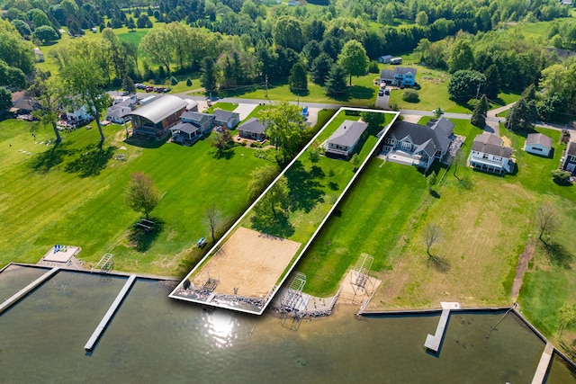 7585 S Indian Lake Dr, Vicksburg, MI 49097 - aerial view of residential area with a large body of water and property boundaries highlighted