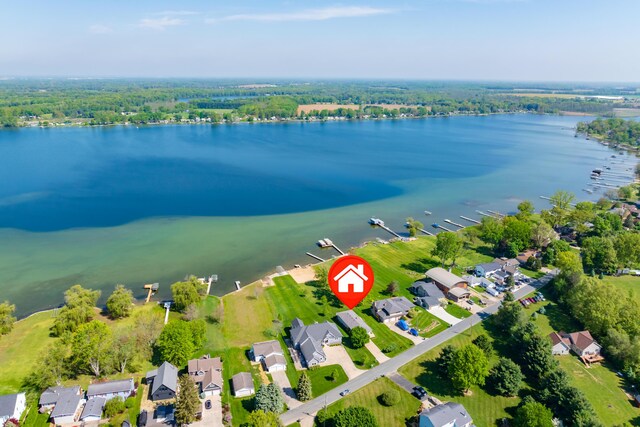 7585 S Indian Lake Dr, Vicksburg, MI 49097 - aerial view of property and surrounding area with a nearby body of water and nearby suburban area