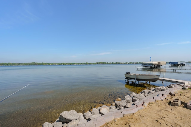 7585 S Indian Lake Dr, Vicksburg, MI 49097 - dock area with boat lift and a water view