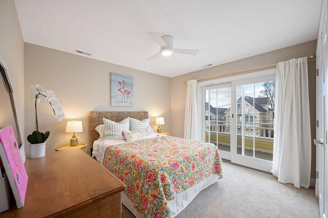 bedroom with carpet floors, access to outside, visible vents, and ceiling fan