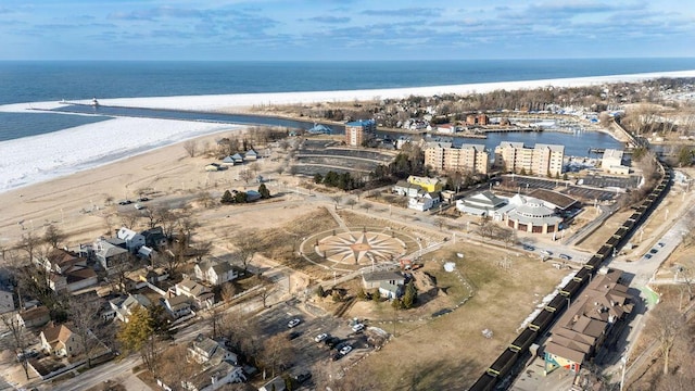 aerial view featuring a water view and a beach view