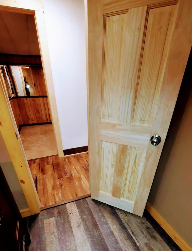 interior details with wood finished floors and baseboards