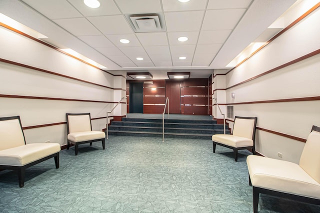 common area with stairs and visible vents