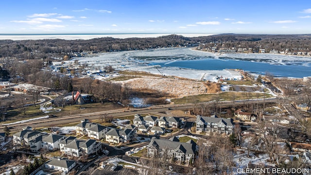 bird's eye view featuring a residential view and a water view