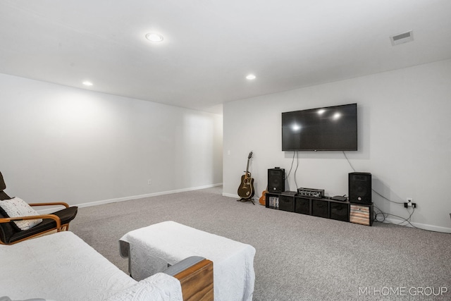 carpeted living room with baseboards, visible vents, and recessed lighting