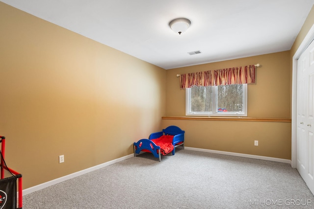 game room featuring carpet, visible vents, and baseboards