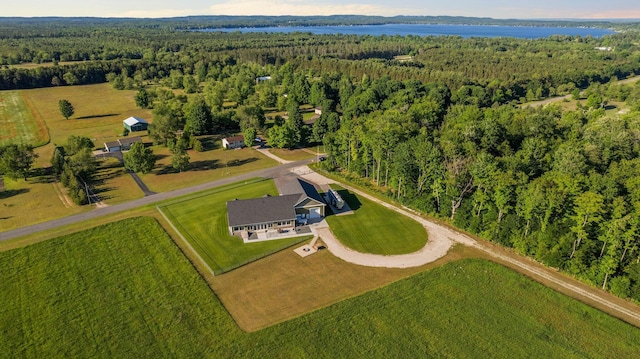 aerial view with a wooded view