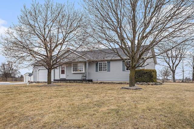 ranch-style home with an attached garage and a front yard