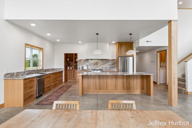 kitchen with stainless steel appliances, visible vents, concrete floors, and a large island