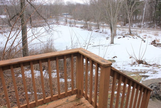 view of snow covered deck