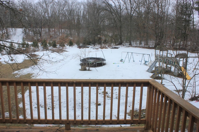 view of yard layered in snow