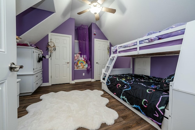 bedroom featuring ceiling fan, vaulted ceiling, and dark wood-style flooring