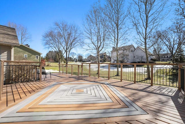 wooden deck with a residential view