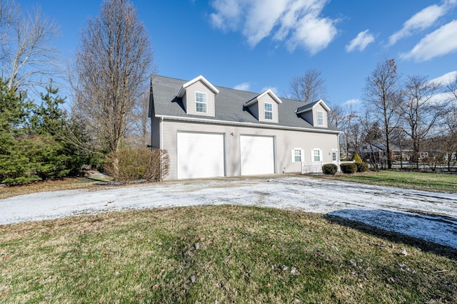 garage featuring driveway