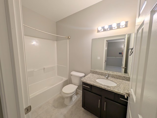 bathroom with tile patterned flooring, vanity, toilet, and shower / bathtub combination