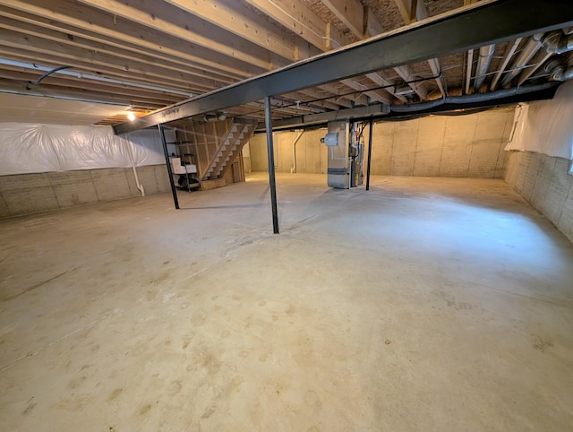 unfinished basement with heating unit