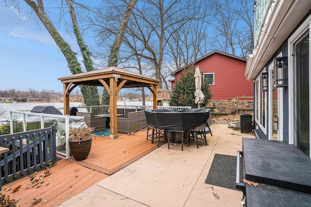 wooden terrace with a gazebo and central AC unit