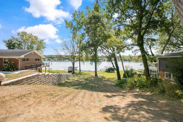 view of yard with a water view