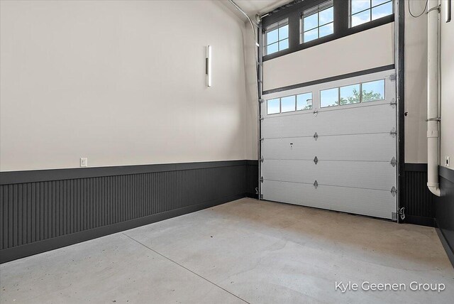 52 E 8th St Ste 210, Holland, MI 49423 - garage featuring a wainscoted wall