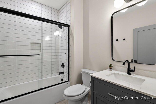 52 E 8th St Ste 210, Holland, MI 49423 - full bath with toilet, enclosed tub / shower combo, and vanity