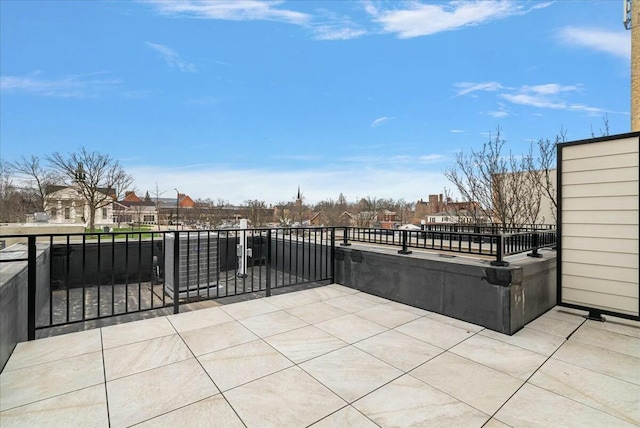 view of patio / terrace with a balcony