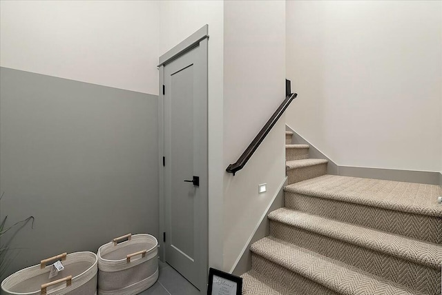 staircase with baseboards