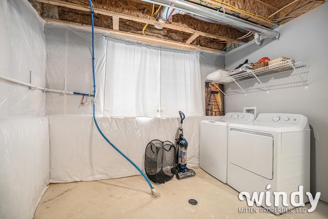 laundry area featuring washer and dryer and laundry area