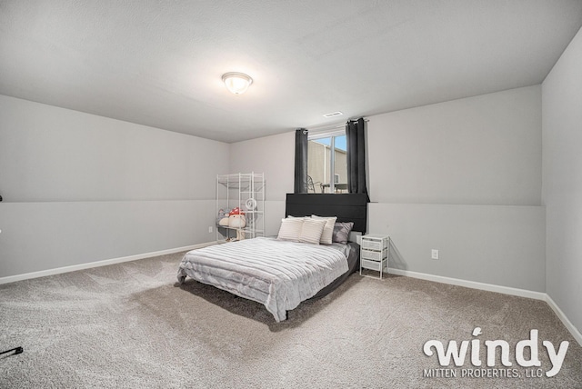 bedroom featuring carpet flooring, visible vents, and baseboards