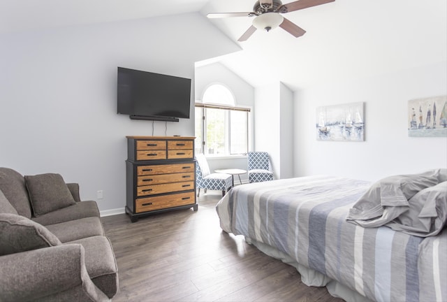 bedroom with lofted ceiling, a ceiling fan, and wood finished floors