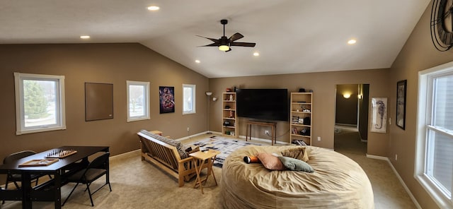 living room featuring lofted ceiling, recessed lighting, baseboards, and light colored carpet