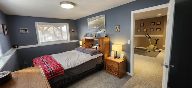 bedroom featuring carpet floors and baseboards