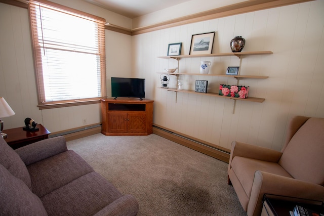 living area featuring a baseboard radiator and light carpet