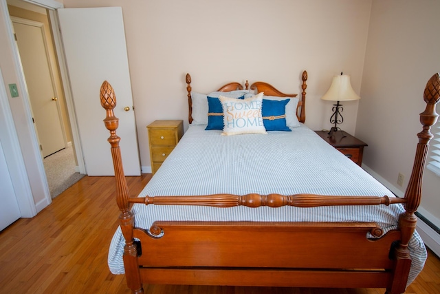 bedroom featuring wood finished floors