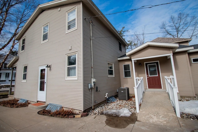 back of property with central AC unit