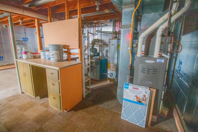 utility room with gas water heater