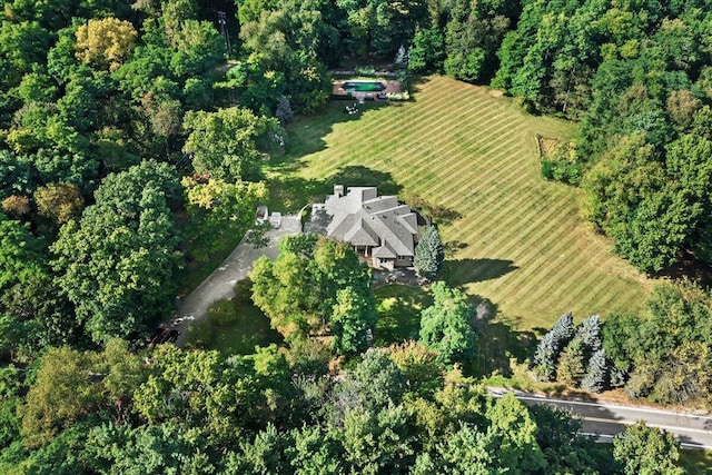 drone / aerial view with a view of trees