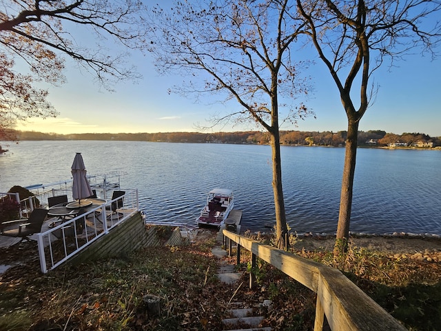 dock area with a water view