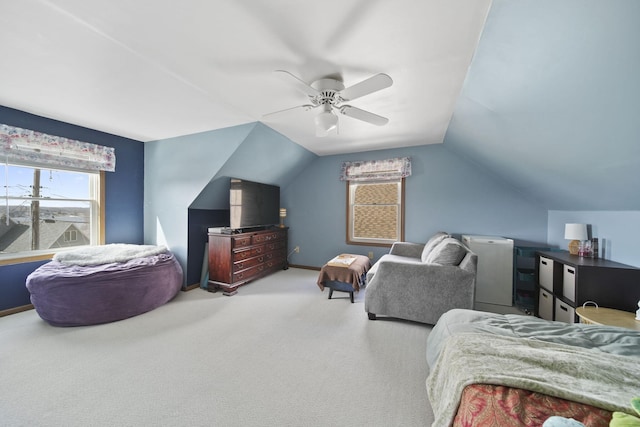 bedroom featuring vaulted ceiling, ceiling fan, carpet, and baseboards