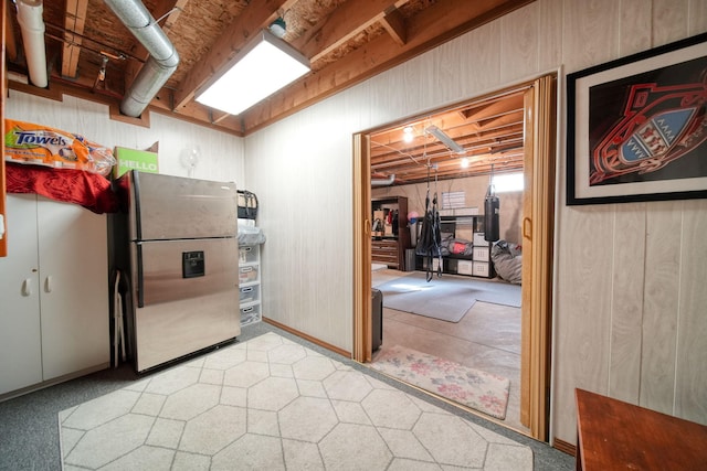 kitchen featuring freestanding refrigerator