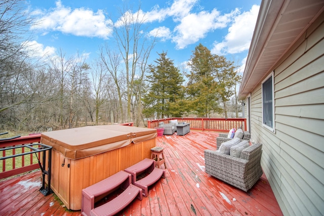 wooden terrace featuring a hot tub