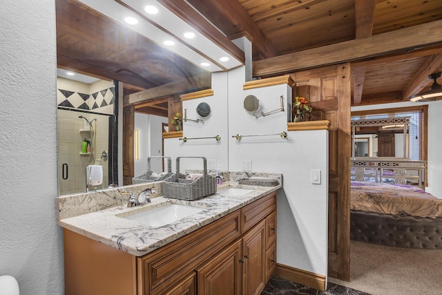 full bath featuring a stall shower, connected bathroom, a sink, wooden ceiling, and beamed ceiling