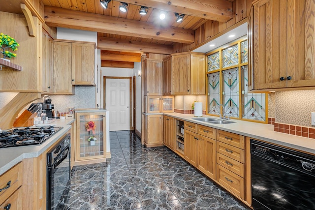 kitchen featuring wood ceiling, light countertops, a sink, and black appliances