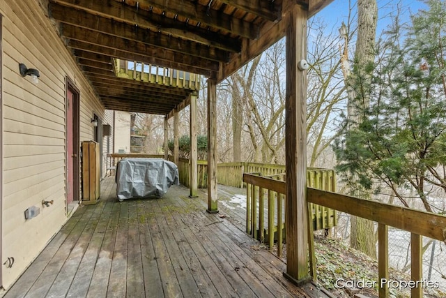 wooden terrace with grilling area